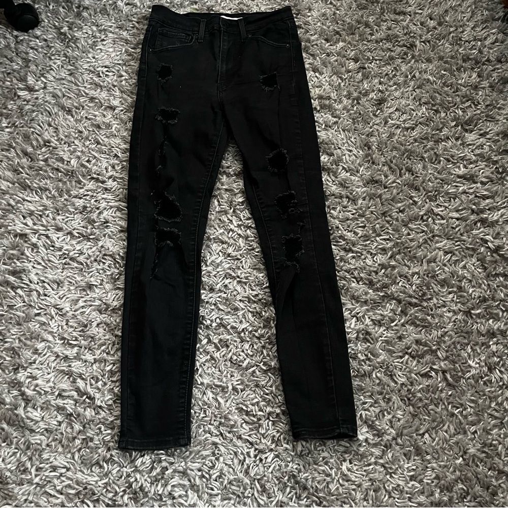Levi’s black high rise distressed skinny jeans size 27